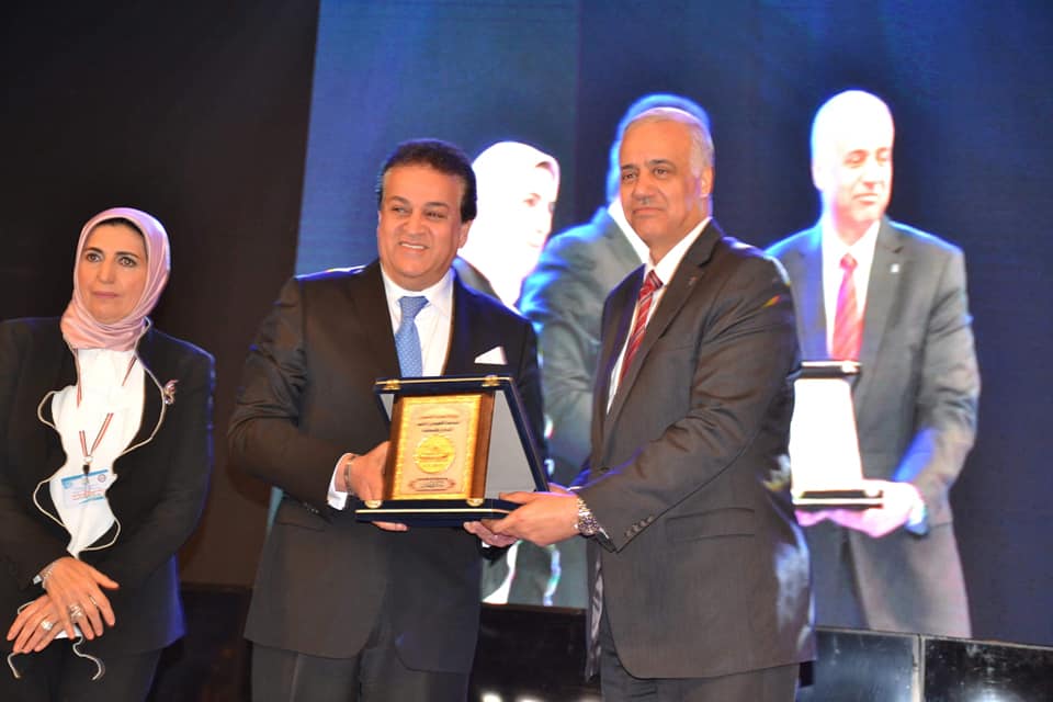 prisident of Alexandria university with minister high education